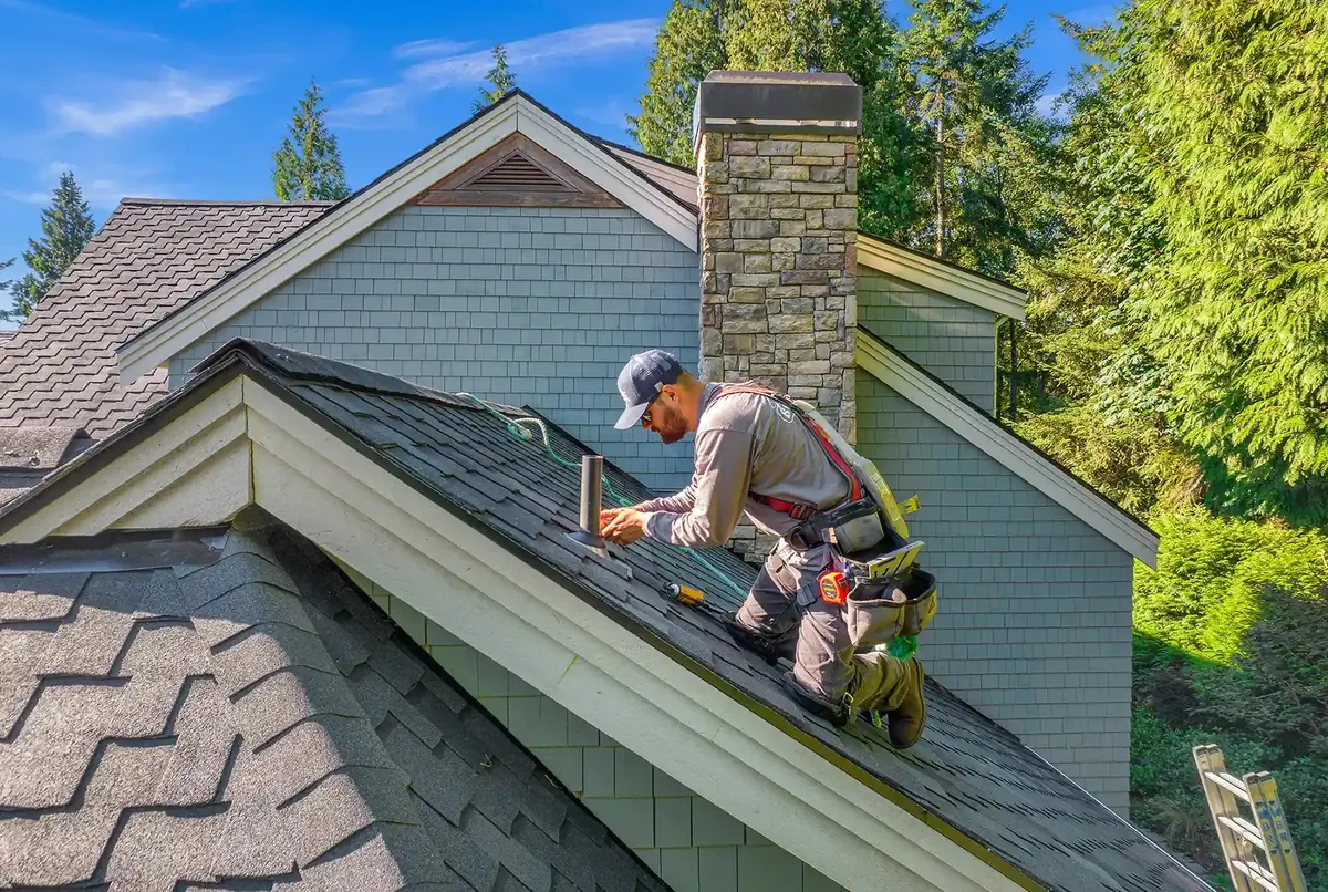 A clean roof valley and clear gutter line after maintenance